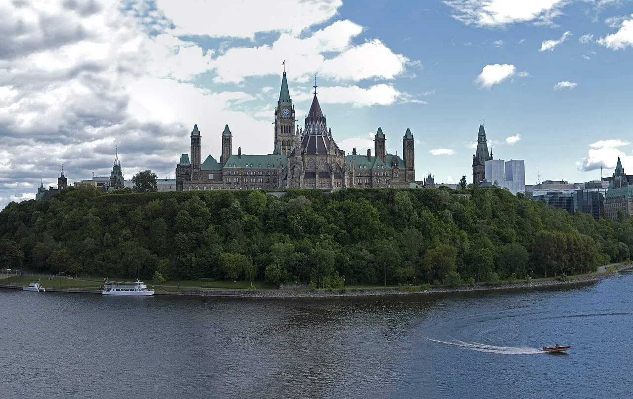 The Canadian Parliament buildings overlooking the Ottawa River