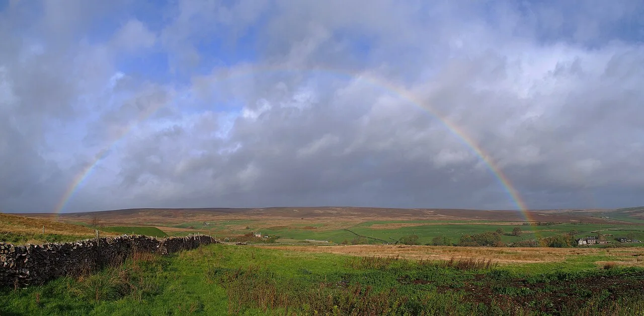 A rainbow above the countryside