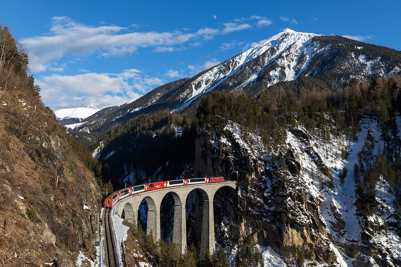 The Glacier Express crossing the Landwasser Viaduct in the mountains